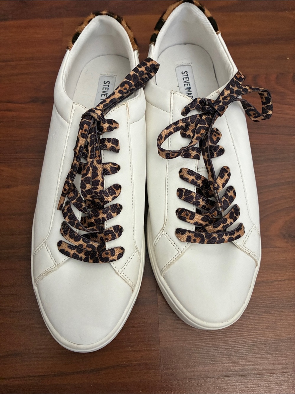 Steve Madden white leather with leopard shoe laces. Brand new